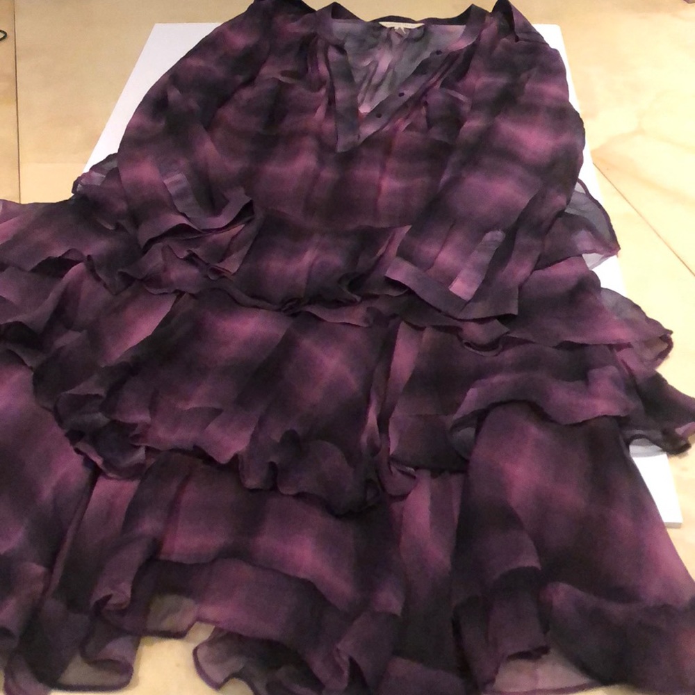 Dress with pleated skirt and attached slip